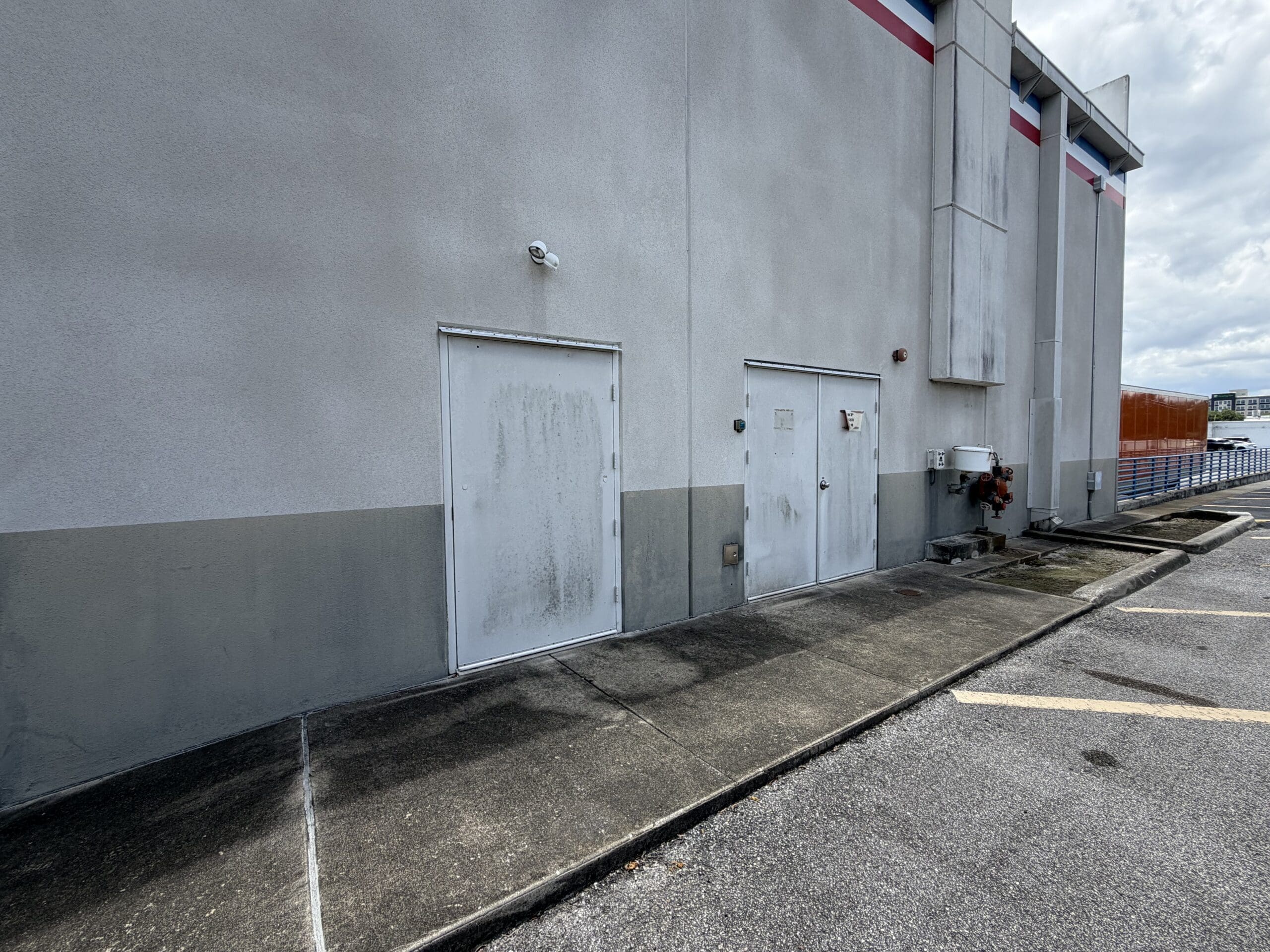 Before — Commercial building exterior in Orlando, FL