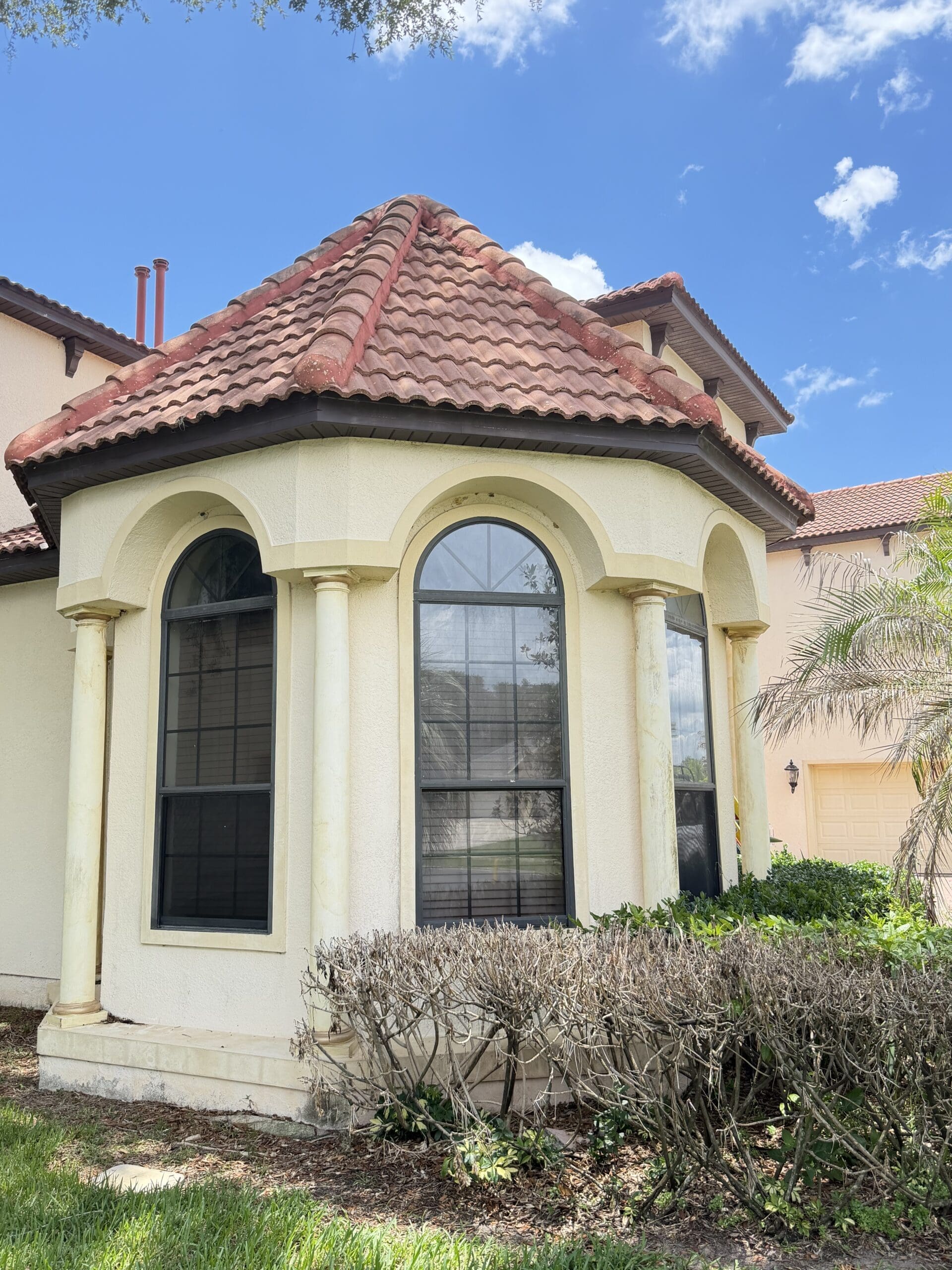 After — Stucco columns and arched windows by SEV-Central Pressure Washing
